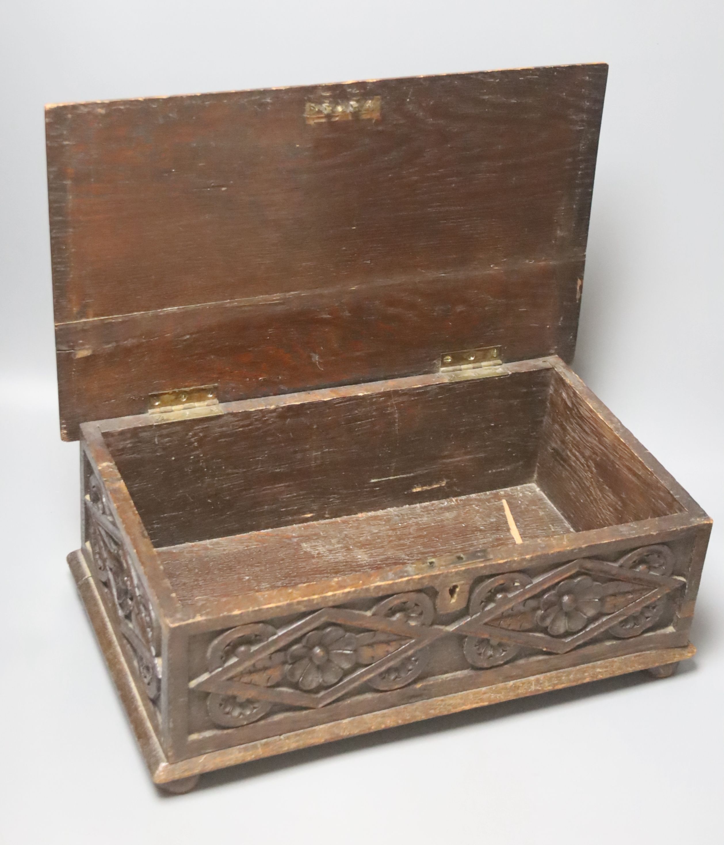 A 1920's carved oak box